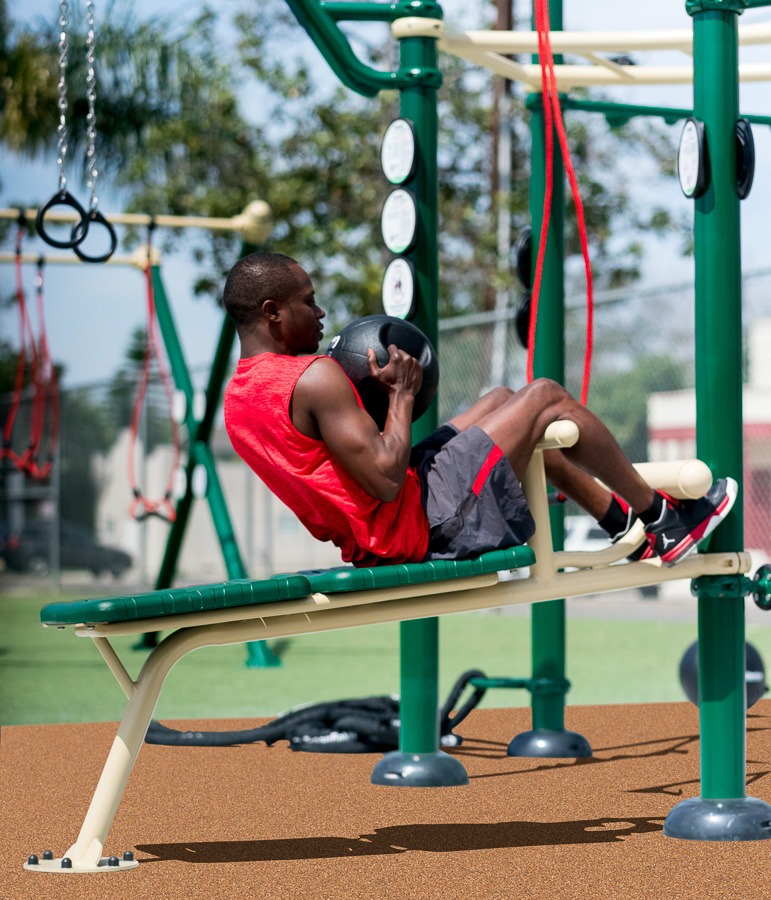 A man doing sit-up on the Incline Sit-Up Bench