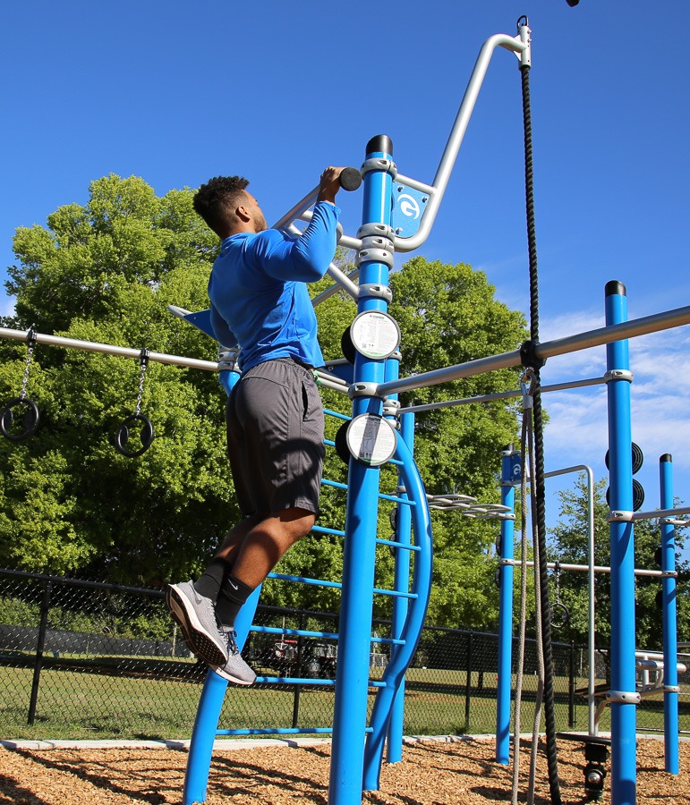 A man doing parallel pull-ups