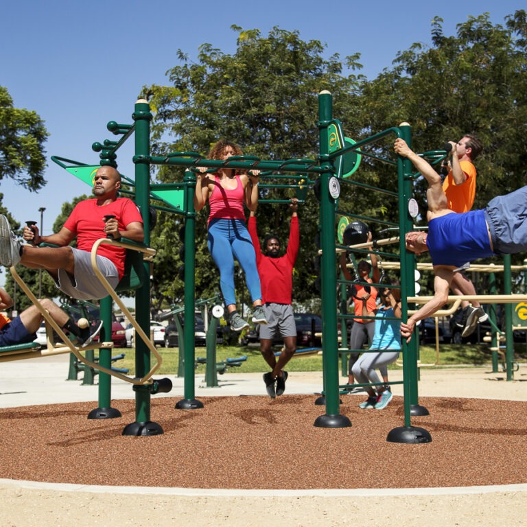 A group of people exercising on the Functional Fitness Rig
